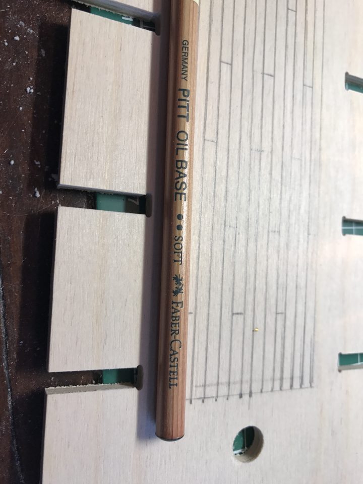 The Pitt oil base pencil used to blacken the sides, next to the trial pattern on the false deck.
