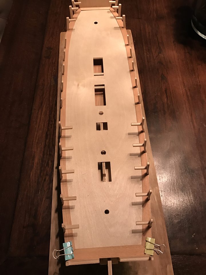The complete margin plank on the gun deck, still loose, with the pieces at the bow slightly wider.
