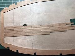 The first planks on the deck, against the margin plank