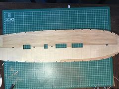 The first half of the gun deck planked, the other half still bare