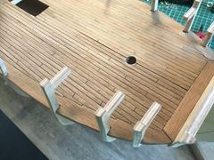 The planked gun deck on the bulkheads