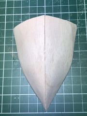 A balsa block cut to the shape of the bow