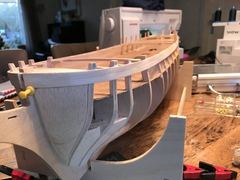 All the filler blocks on, with the first two strips of the planking