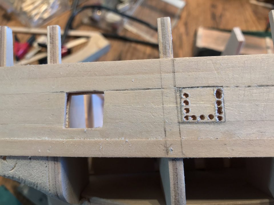 The first gunports cut out on the starboard side