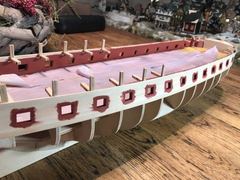 Two coats on one side, three on the other