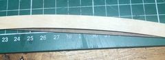 The planking extended below with a curved piece