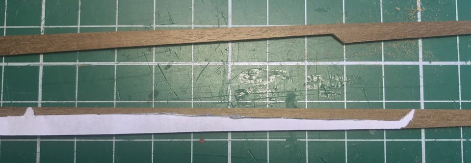 The width transferred to the strip with a bit of paper