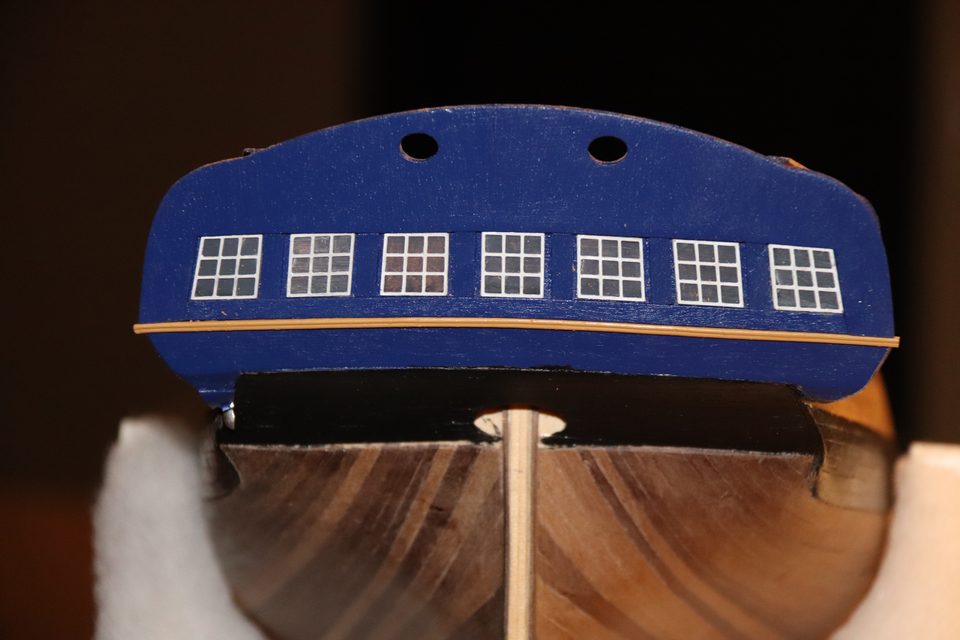 The first moulding on the transom