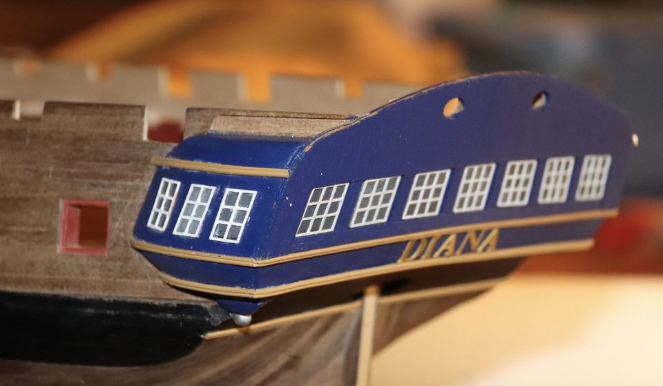 The failed first attempt: the windows sit askew in the openings and the CA glue has left white marks.