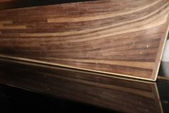 The difference in thickness between the planked after part and the unplanked forward part of the keel
