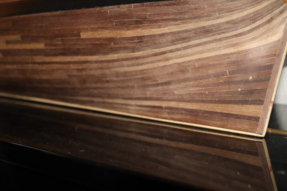The difference in thickness between the planked after part and the unplanked forward part of the keel