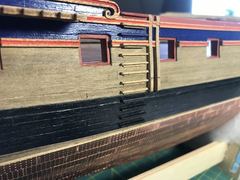 The side steps on the starboard side between the fenders