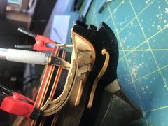 Detail of the bow, with clamps