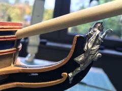 The bowsprit fitted, with the figurehead beneath it