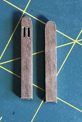 Two catheads from 5 mm walnut, one already with the slots in the head