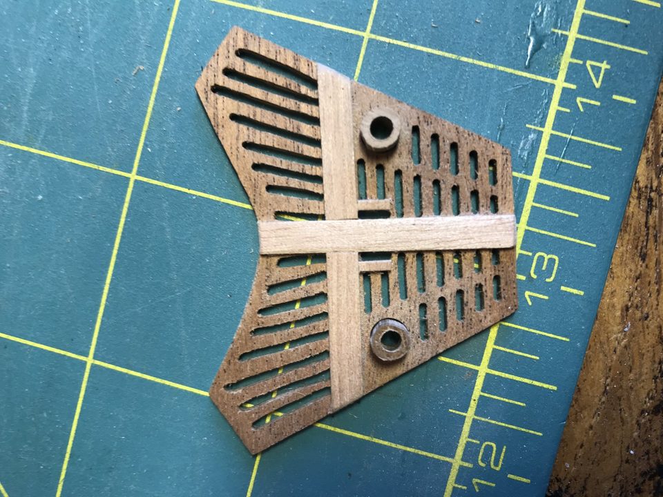 The result: the head grating with the two home-made toilet bowls in place.