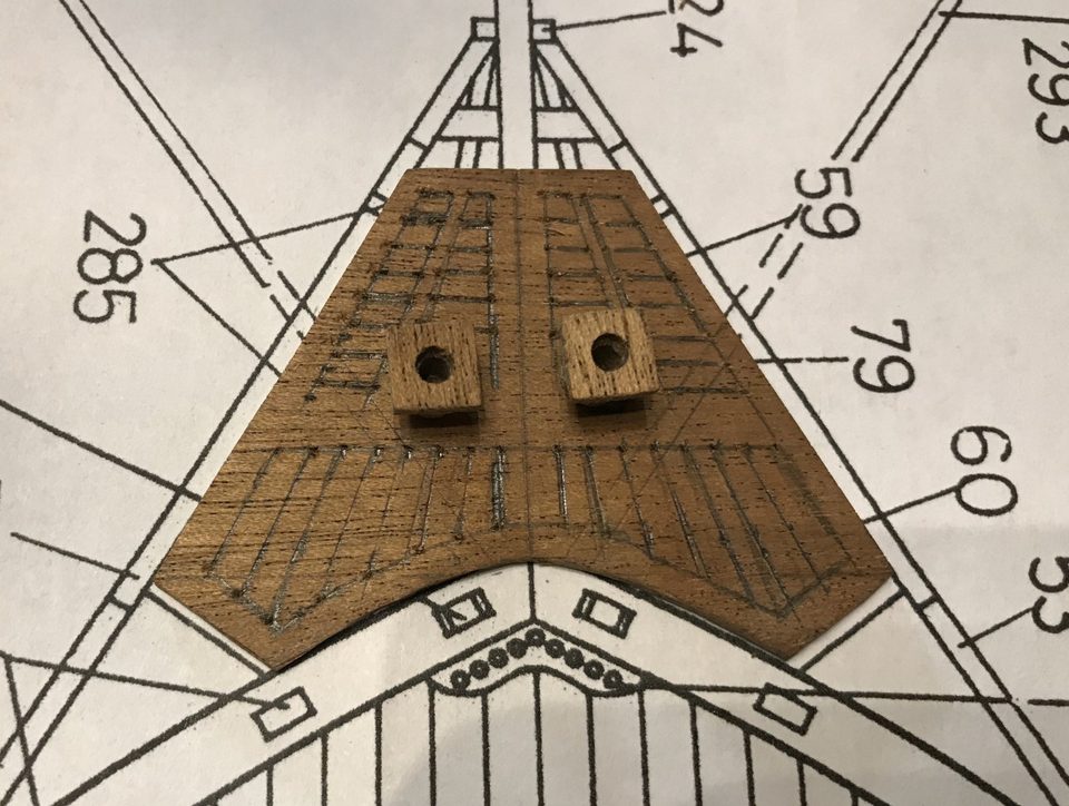The sawn-out grating on the kit drawing, with the two holes for the seats of ease moved towards the centre.