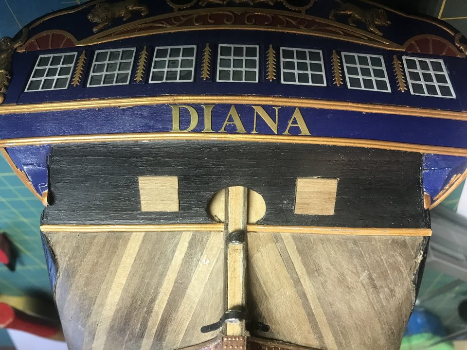 The two openings cut in the transom, with the lids fitted loosely.