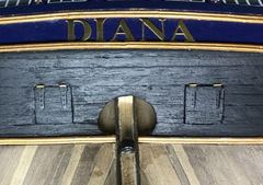 Small brass pieces as hinges against the hull