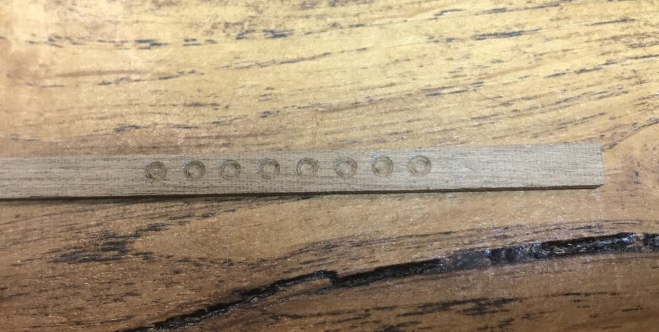 The result: a row of identical hollows in the strip.