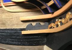The fitting with the hawse holes is too tall to go under the headrails