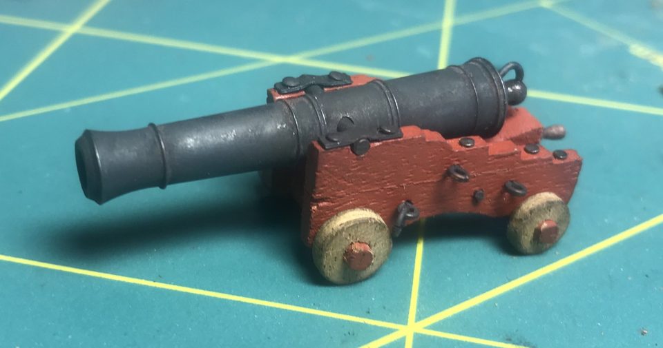 The cheek close up: the black heads of the kit nails stand in for the bolts, with the scribed dividing line between them.