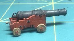 The guns from the side, with breeching ring and handle on the quoin