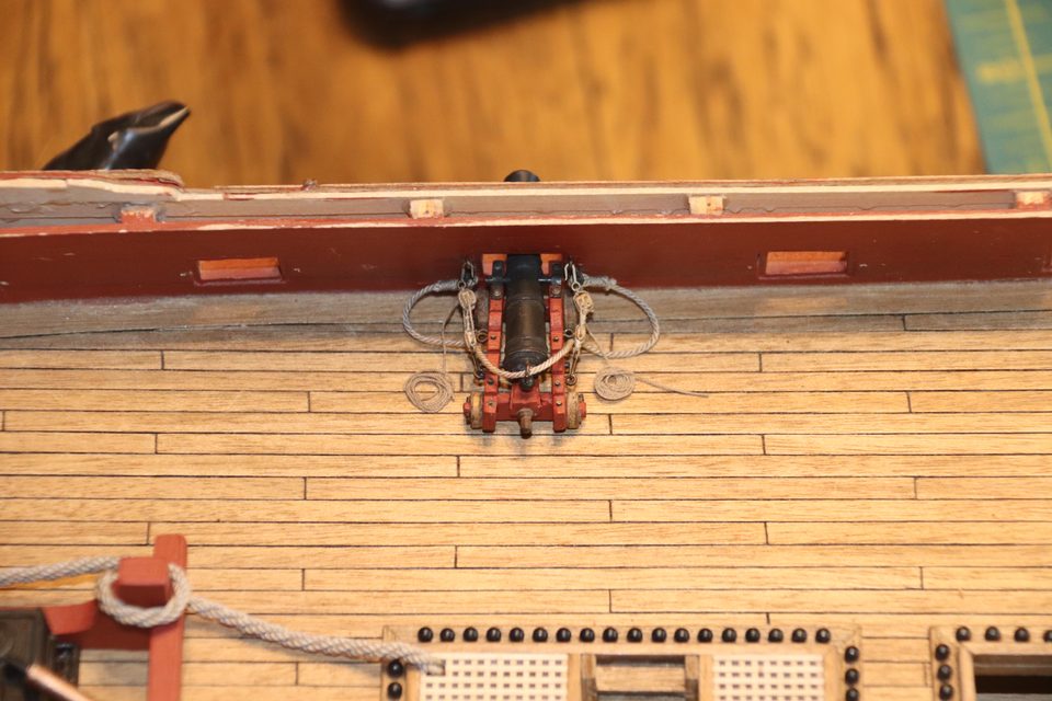 The result: a gun with both gun tackles rove, the small block secured with a seizing of silk thread instead of a knot.