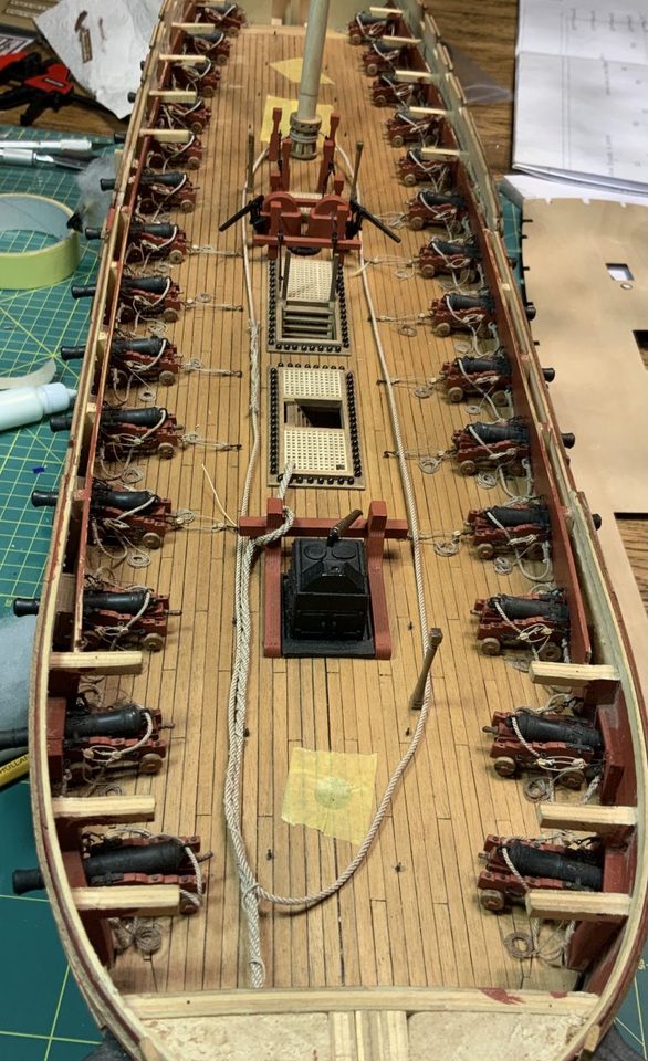 The result: the messenger runs with three rollers over the gun deck, past the guns and the pump assembly, to the capstan.