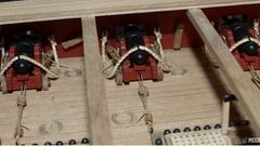Photo from Piet's build log: the pieces of wood between the guns in the waist