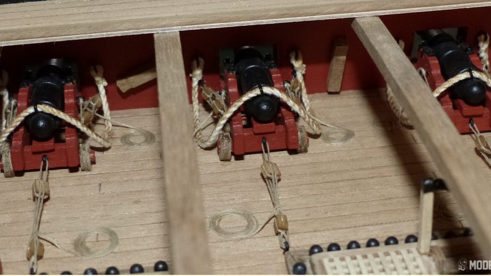 Photo from Piet's build log: the pieces of wood between the guns in the waist