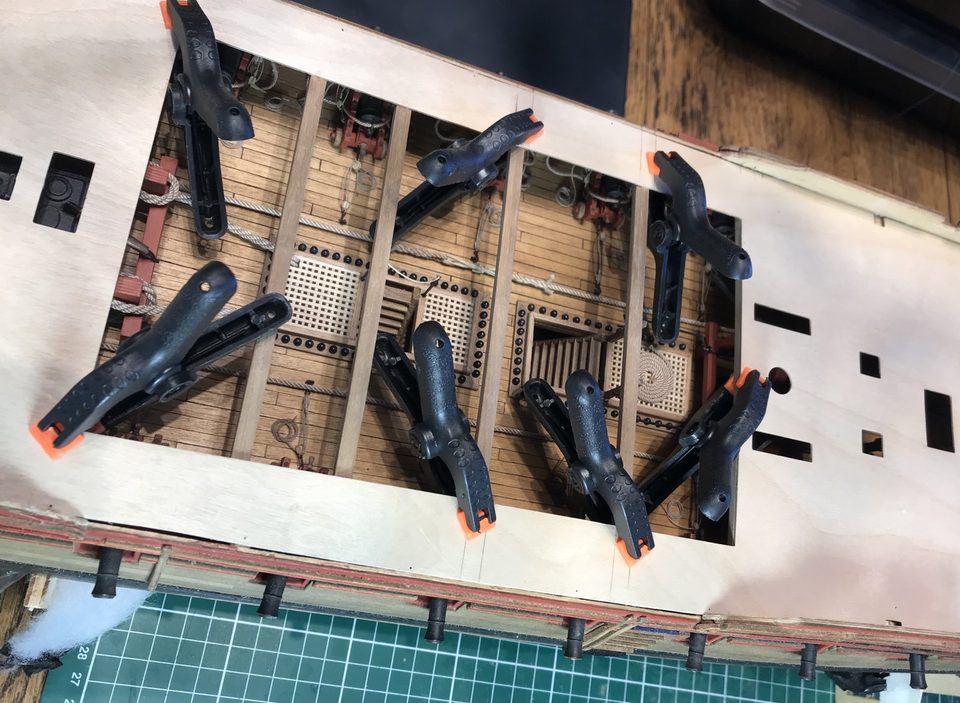 Gun deck with anchor cable and messenger, while the upper deck beams are being glued