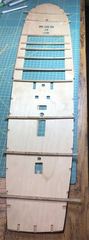 Temporary bulkheads with the correct sheer glued under the deck