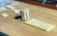 The oak capstan on the upper deck, next to the grating