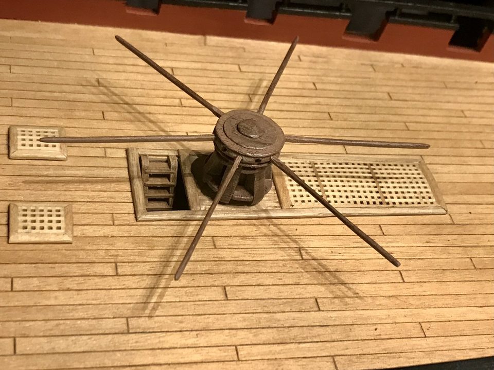 The capstan finally glued down, with capstan bars and the ladder in the ladderway