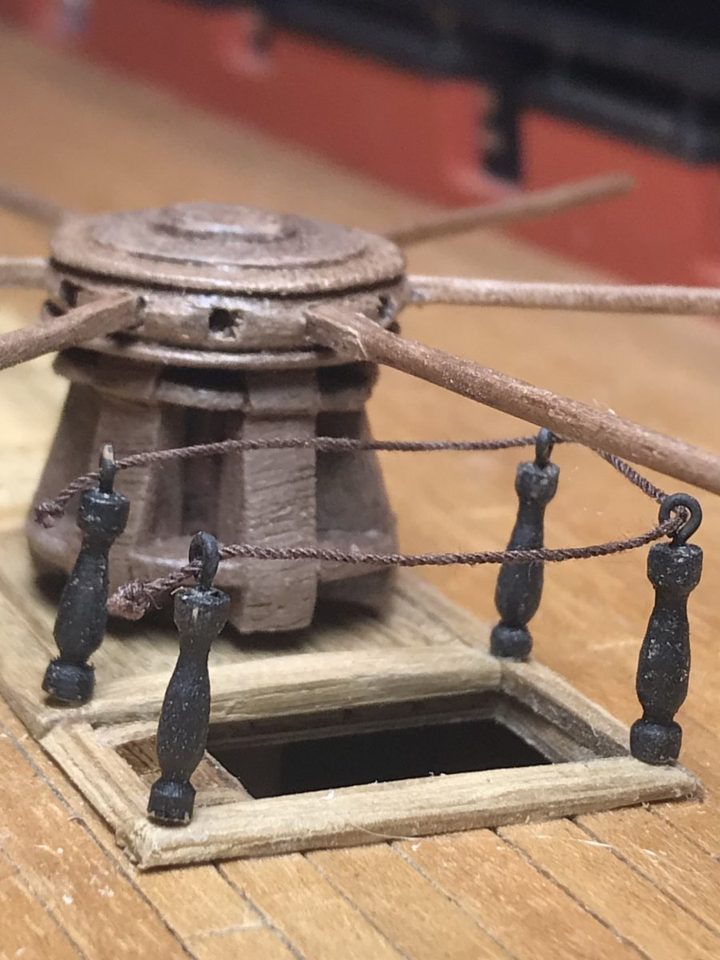Attempt one: black stanchions from round sticks, with oversized black rings.