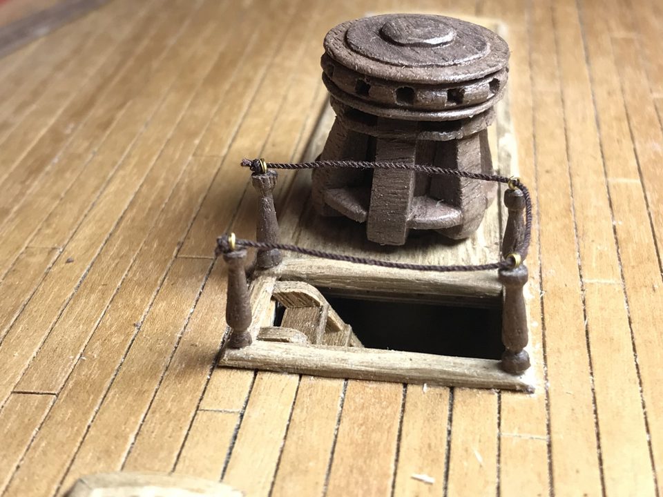 Attempt two: walnut with brass rings, but the stanchions still differ in shape.