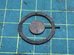 The first spoke as a test in the notches of the rim and the hub