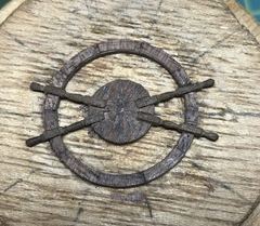 Four spokes in the wheel; the spoke at bottom left doesn't belong