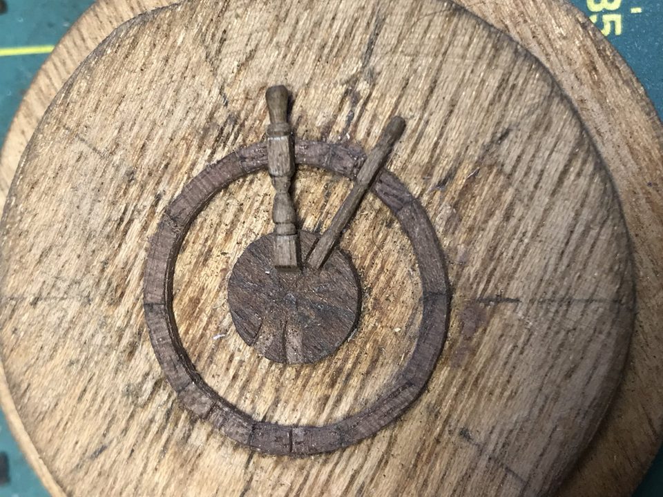 The handsome but too thick spoke (vertical) next to the spoke to scale