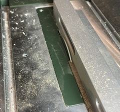 The 1.06 mm strip on the table saw