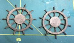 Both wheels, the side with the 0.3 mm rings