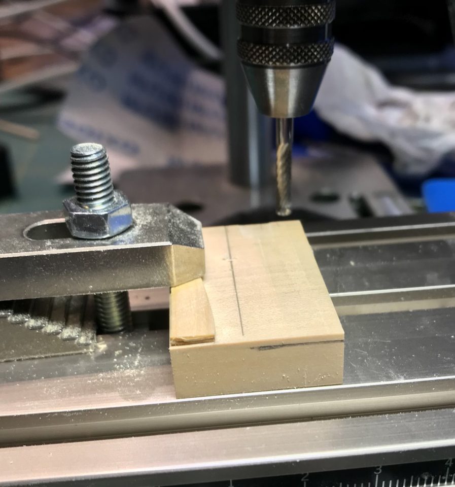 The Castello block clamped on the cross-slide table, the mill above it.