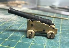 From the side, with the pins through the cheeks