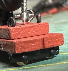 The truck base close up, with pin heads as bolt heads