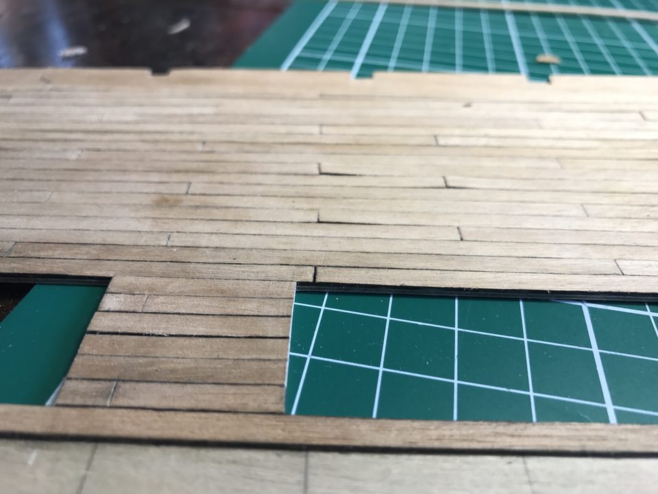 Filled in row by row from the long strip; the butt ends meet properly.