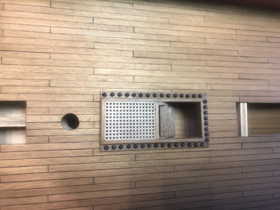 From above: the shot garland around the hatch with the grating, glued to the gun deck.