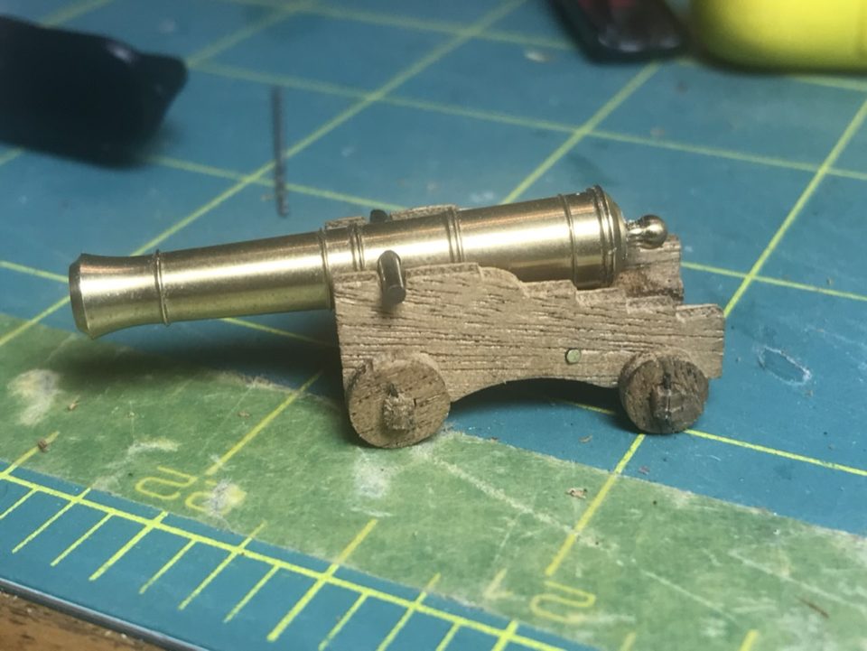 This is how the brass barrel comes out of the kit: shiny and still greasy, here trial-fitted on an unpainted carriage.