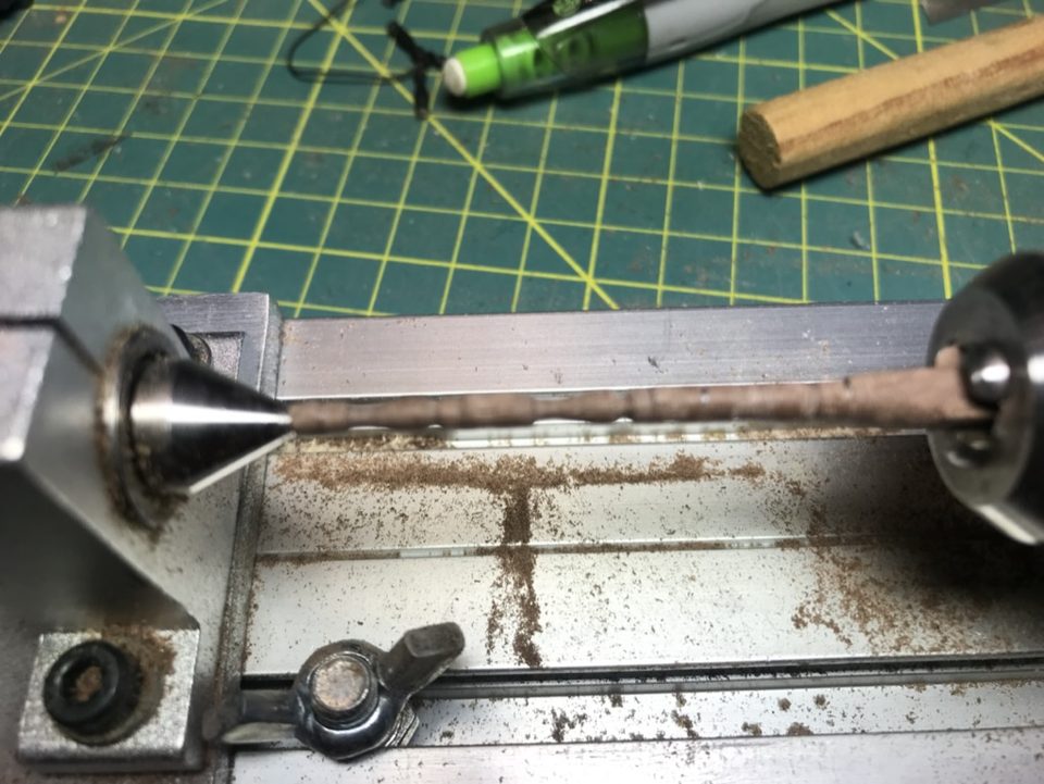 The lathe with the walnut chucked, from a little further away.